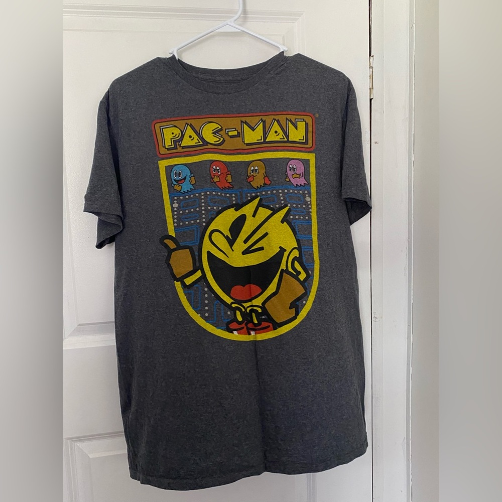 Pac-Man Mens T-Shirt - Winking Pac-Man Over Game board Image